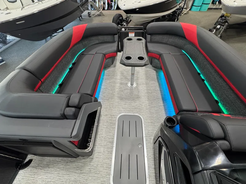 Slide: The Image of 2025 Bennington M Quad Bench 24 MFB interior with LED lighting and modern seating. - 15