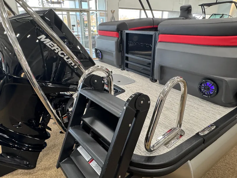 Slide: The Image of 2025 Bennington M Quad Bench 24 MFB boat with Mercury engine and sleek interior design. - 23