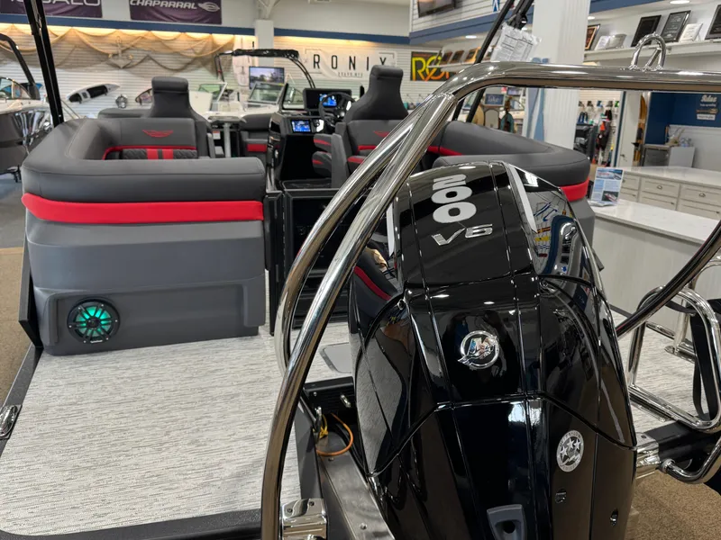 Slide: The Image of 2025 Bennington M Quad Bench 24 MFB boat interior with powerful V8 engine. - 24