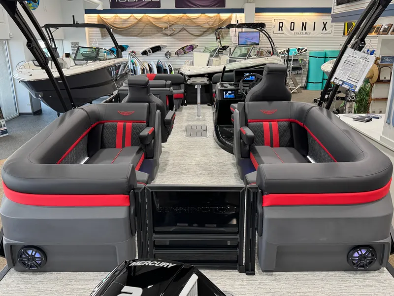 Slide: The Image of 2025 Bennington M Quad Bench 24 MFB boat interior with luxurious seating and modern design. - 25