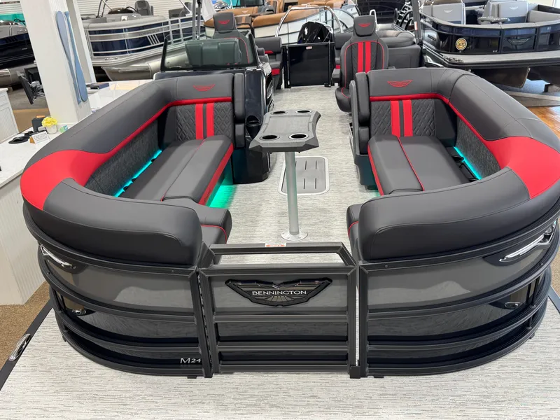 Slide: The Image of 2025 Bennington M Quad Bench 24 MFB pontoon boat with stylish seating and modern design. - 27