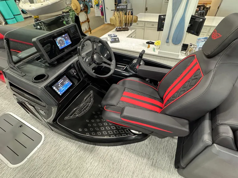 Slide: The Image of Luxurious helm of 2025 Bennington M Quad Bench 24 MFB with advanced controls and seating. - 3
