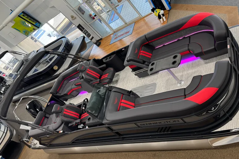 Slide: The Image of 2025 Bennington M Quad Bench 24 MFB pontoon boat with modern seating and LED lighting. - 33
