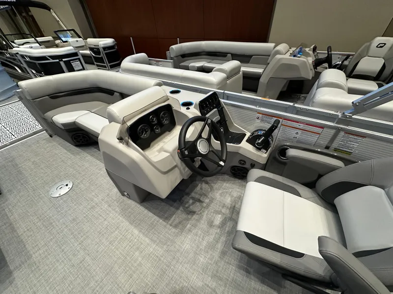 Slide: The Image of 2025 Princecraft Vectra 21 RL pontoon boat interior with modern seating and steering console. - 6
