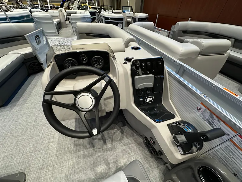 Slide: The Image of 2025 Princecraft Vectra 21 RL boat interior with steering wheel and control panel. - 7