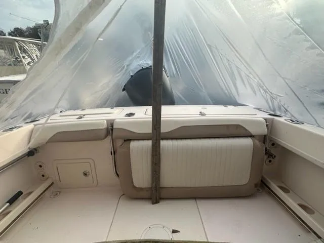Slide: The Image of 2014 Grady-White 225 Freedom boat interior with protective cover. - 6