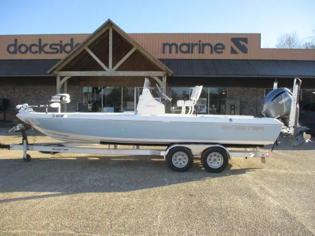 Slide: The Image of 2022 Skeeter SX240 boat on trailer outside Dockside Marine dealership. - 1