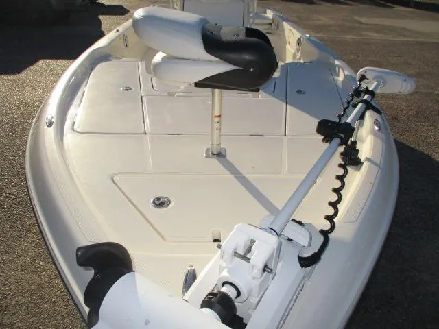 Slide: The Image of 2022 Skeeter SX240 boat deck with trolling motor and seating. - 3