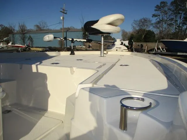 Slide: The Image of 2022 Skeeter SX240 boat deck with seating and fishing rod holder. - 8