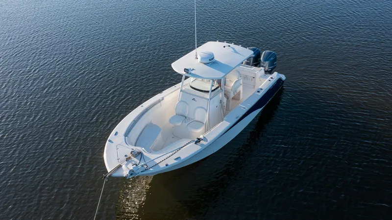 Slide: The Image of 2012 Sea Fox 286 Commander boat on calm water, aerial view. - 11
