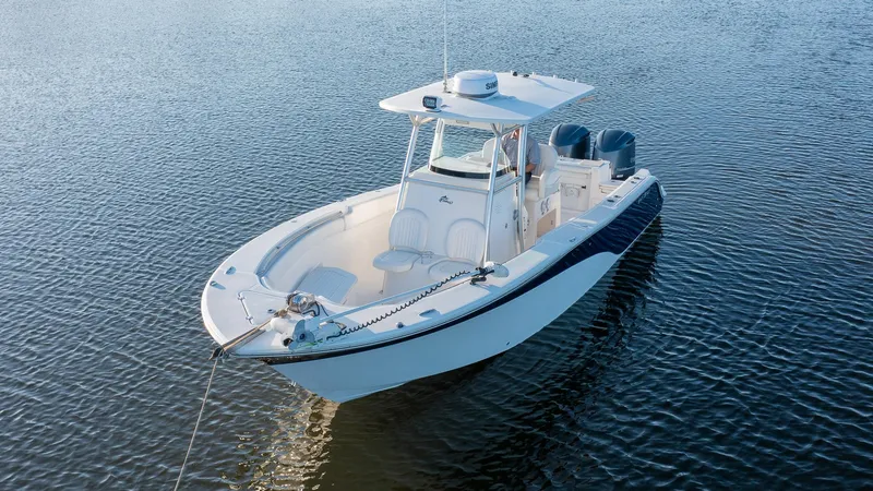 Slide: The Image of 2012 Sea Fox 286 Commander boat on calm water. - 18