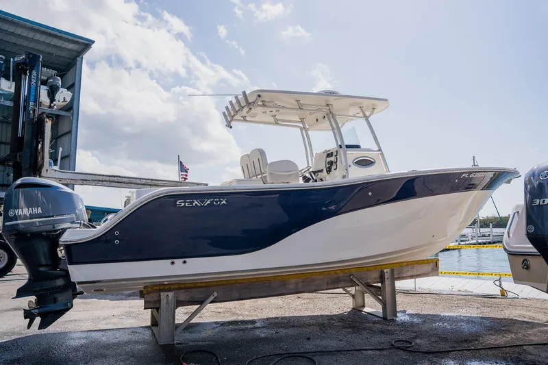 Slide: The Image of 2012 Sea Fox 286 Commander boat on display with Yamaha outboard motor. - 29