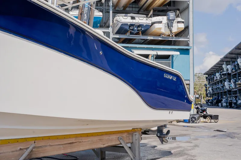 Slide: The Image of 2012 Sea Fox 286 Commander boat in storage facility, side view. - 33