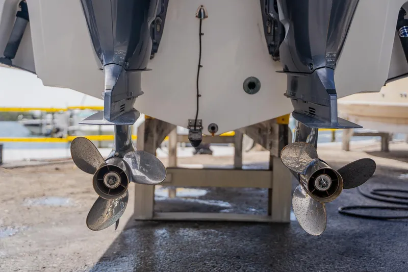 Slide: The Image of Twin propellers of a 2012 Sea Fox 286 Commander boat on a dry dock. - 38