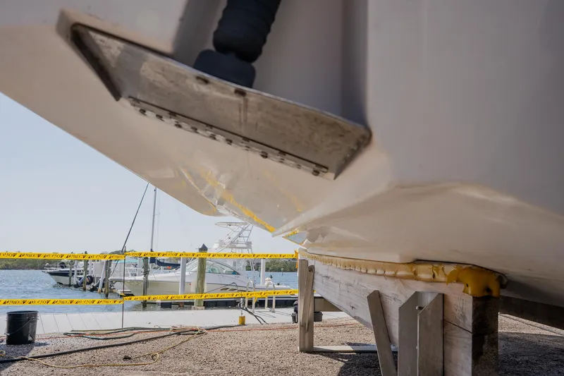 Slide: The Image of Close-up of 2012 Sea Fox 286 Commander boat hull on a dock. - 40