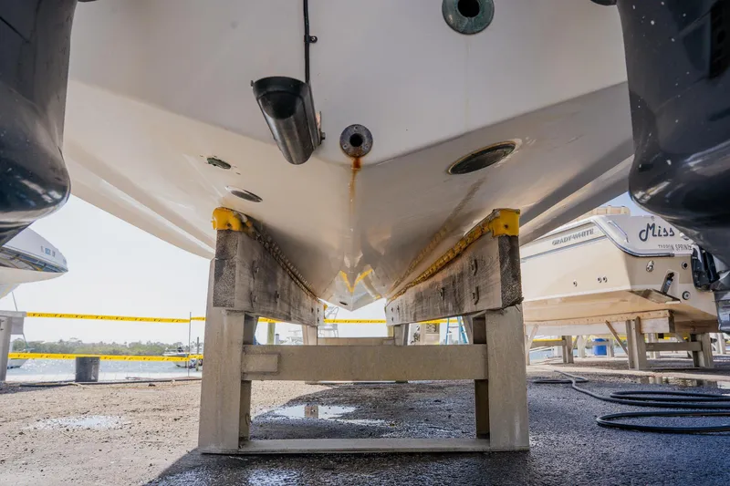 Slide: The Image of Underneath view of a 2012 Sea Fox 286 Commander boat on a stand. - 41