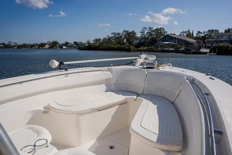 Slide: The Image of 2012 Sea Fox 286 Commander boat with spacious seating on calm water. - 42