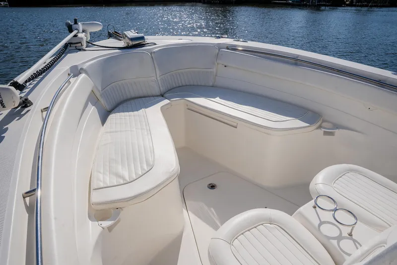 Slide: The Image of 2012 Sea Fox 286 Commander boat with spacious white seating area. - 43
