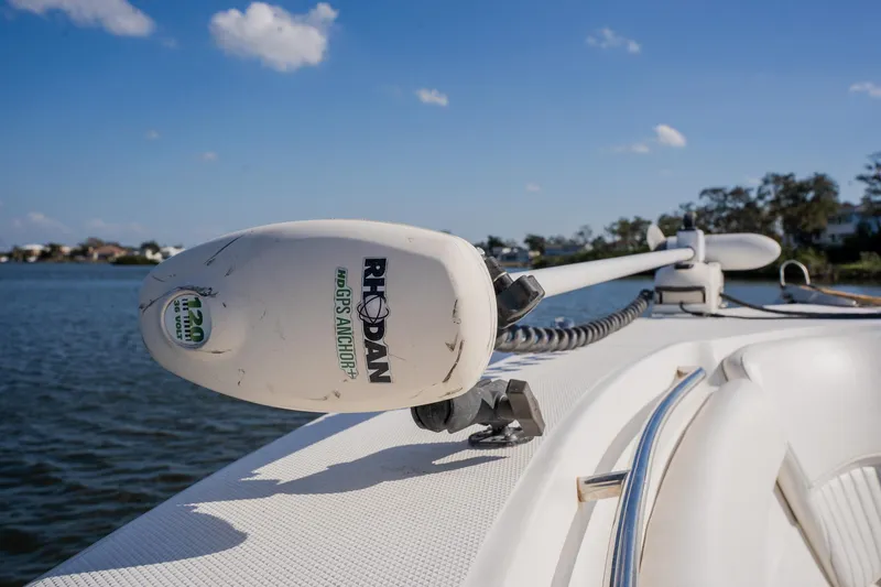 Slide: The Image of Sea Fox 286 Commander 2012 boat with trolling motor on calm water. - 46