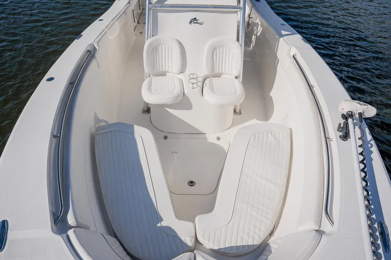 Slide: The Image of 2012 Sea Fox 286 Commander boat interior with seating, on calm water. - 48