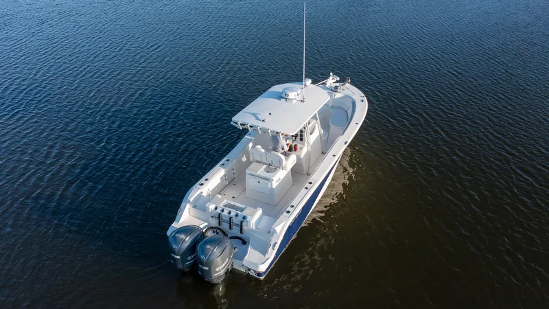 Slide: The Image of 2012 Sea Fox 286 Commander boat on calm water, aerial view. - 7