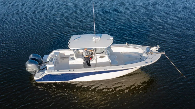 Slide: The Image of 2012 Sea Fox 286 Commander boat on calm water, aerial view. - 8