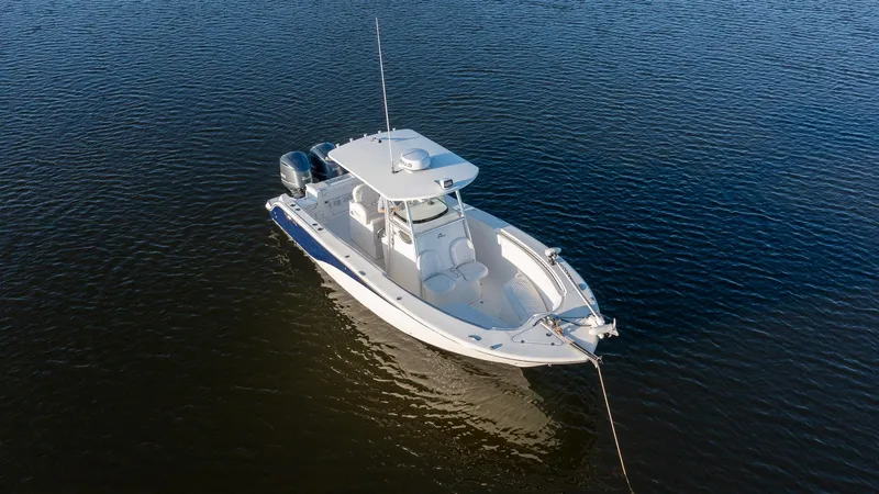 Slide: The Image of 2012 Sea Fox 286 Commander boat on calm water, aerial view. - 9