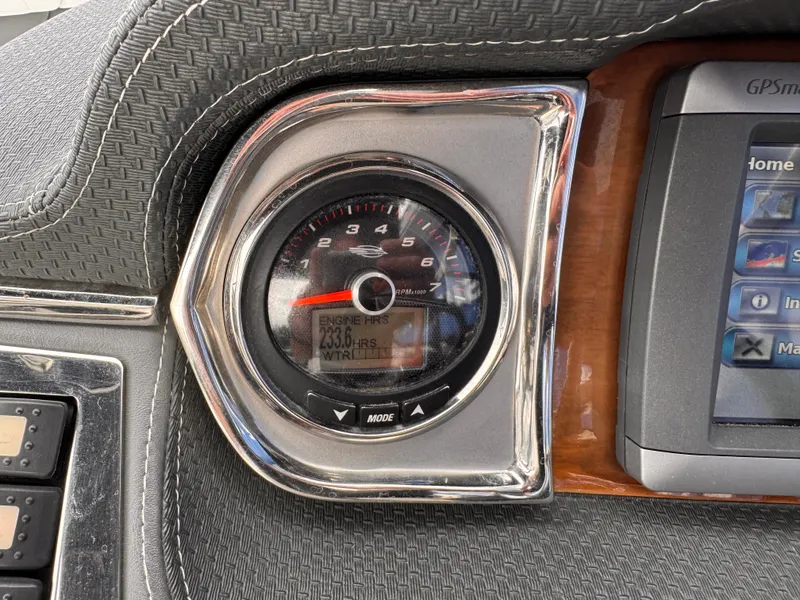 Slide: The Image of Dashboard of 2013 Chaparral 257 SSX boat with Garmin navigation system. - 14