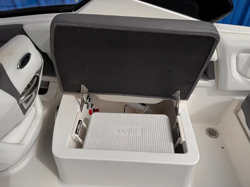 Slide: The Image of 2013 Chaparral 257 SSX boat interior with dashboard and steering wheel. - 29