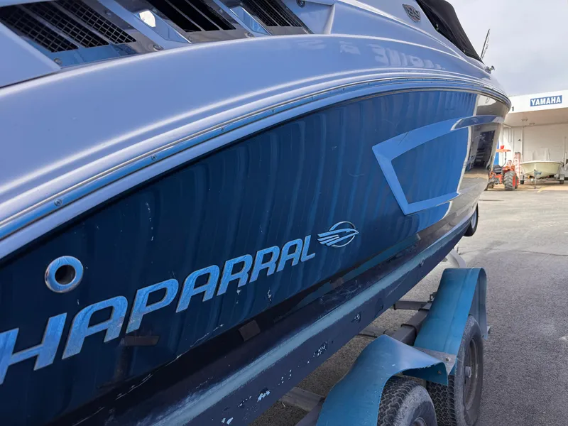 Slide: The Image of 2013 Chaparral 257 SSX boat on trailer, side view with registration number NJ 8812 HF. - 3