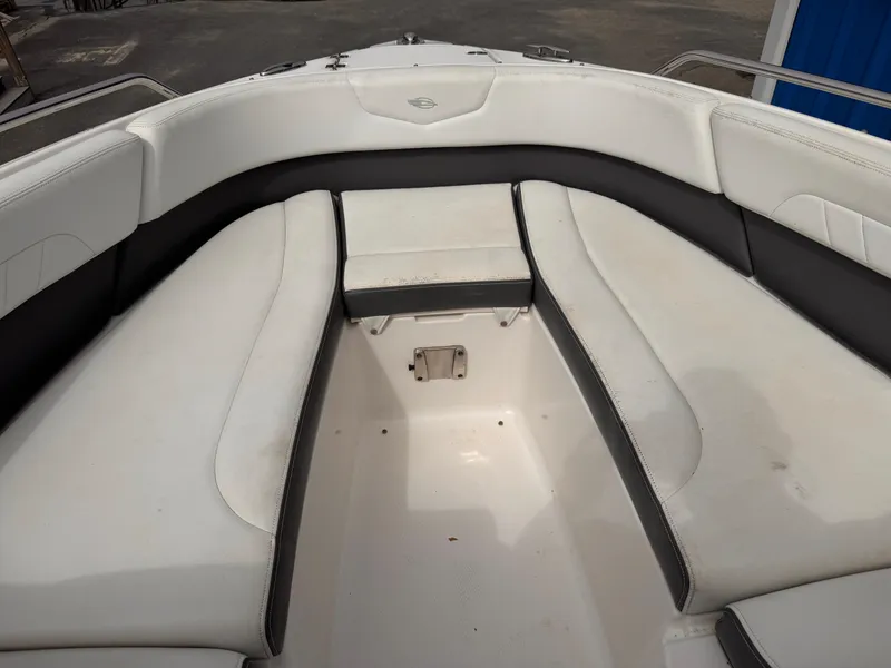 Slide: The Image of 2013 Chaparral 257 SSX boat interior with white and black seating. - 33