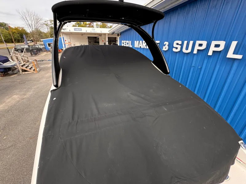 Slide: The Image of 2013 Chaparral 257 SSX boat on trailer, side view with logo visible. - 4