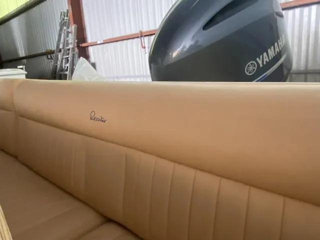 Slide: The Image of 2018 Rossiter 20 Coastal Cruiser with Yamaha engine in a storage facility. - 3