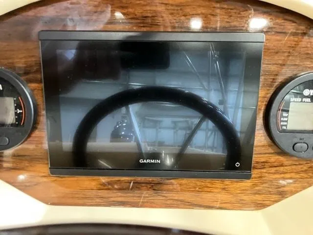 Slide: The Image of Dashboard of 2018 Rossiter 20 Coastal Cruiser with Garmin display and gauges. - 6