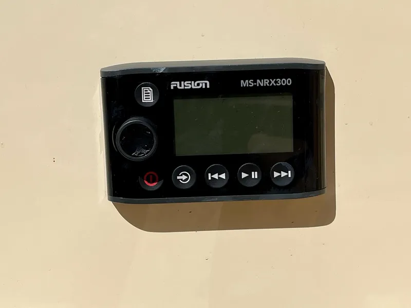 Slide: The Image of Fusion MS-NRX300 marine stereo controller on 2018 Rossiter 20 Coastal Cruiser. - 7