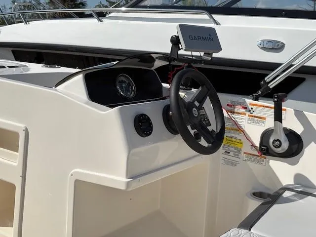 Slide: The Image of 2023 Bayliner Element M17 boat dashboard with Garmin navigation system. - 5