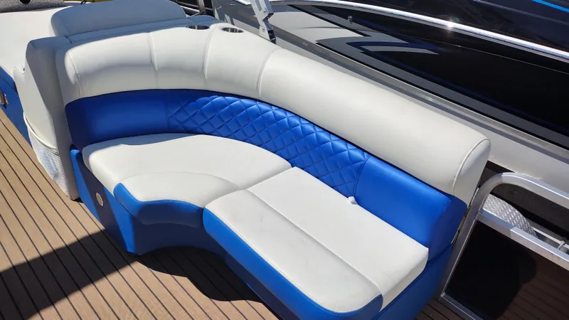 Slide: The Image of Luxurious blue and white seating on 2012 Veranda RFL2575V boat deck. - 33