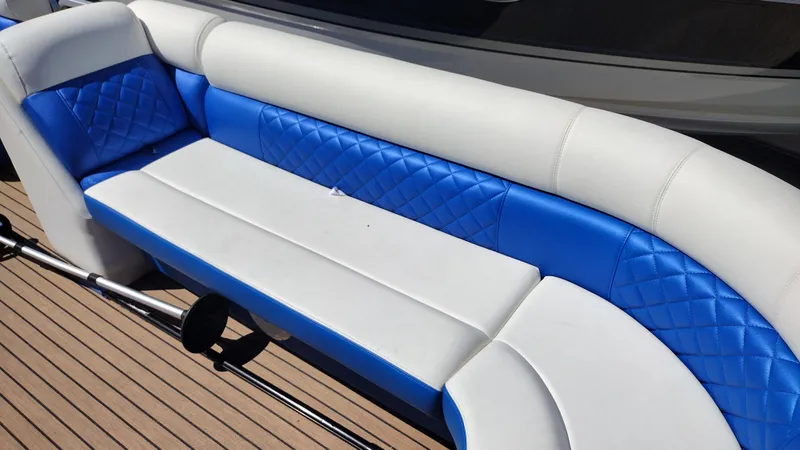 Slide: The Image of Blue and white boat seating on 2012 Veranda RFL2575V, featuring quilted design. - 40