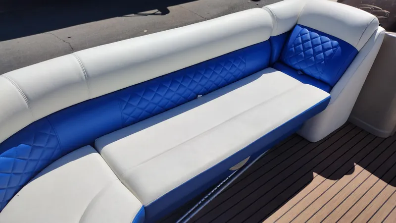Slide: The Image of Luxurious seating on 2012 Veranda RFL2575V boat with blue and white upholstery. - 41