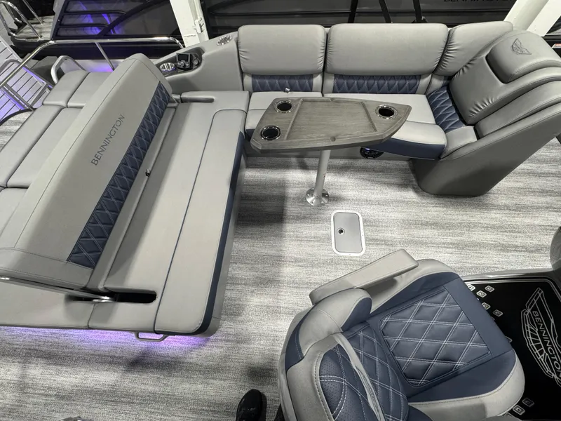Slide: The Image of 2025 Bennington 25 RSB boat interior with luxurious seating and modern design. - 10