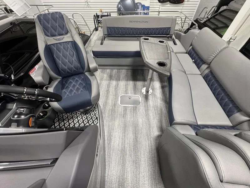 Slide: The Image of 2025 Bennington 25 RSB boat interior with luxurious seating and modern design. - 7