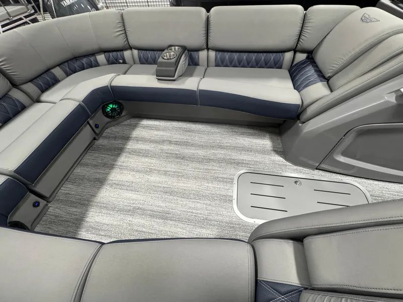 Slide: The Image of Luxurious seating area of 2025 Bennington 25 RSB pontoon boat with modern upholstery. - 8
