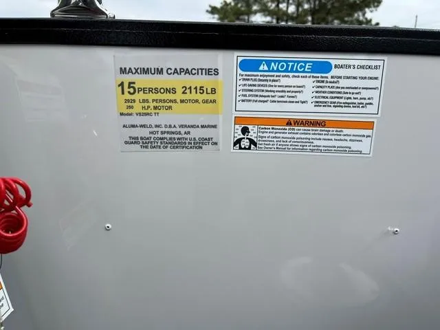 Slide: The Image of 2025 Veranda Vista Sport 25RC capacity label, 15 persons, 2115 lbs, safety notices. - 14