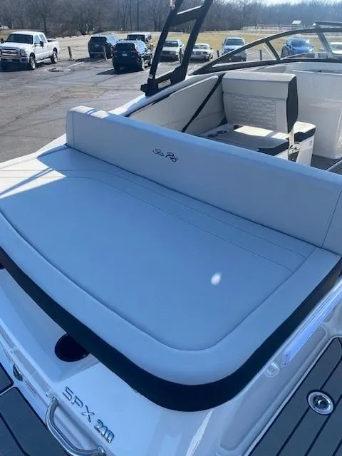 Slide: The Image of 2025 Sea Ray SPX 210 boat with spacious seating and sleek design. - 5