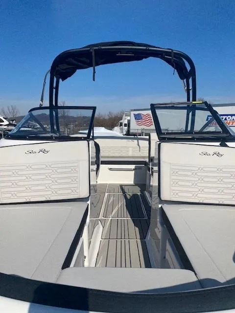Slide: The Image of 2025 Sea Ray SPX 210 boat interior with open deck and seating. - 8
