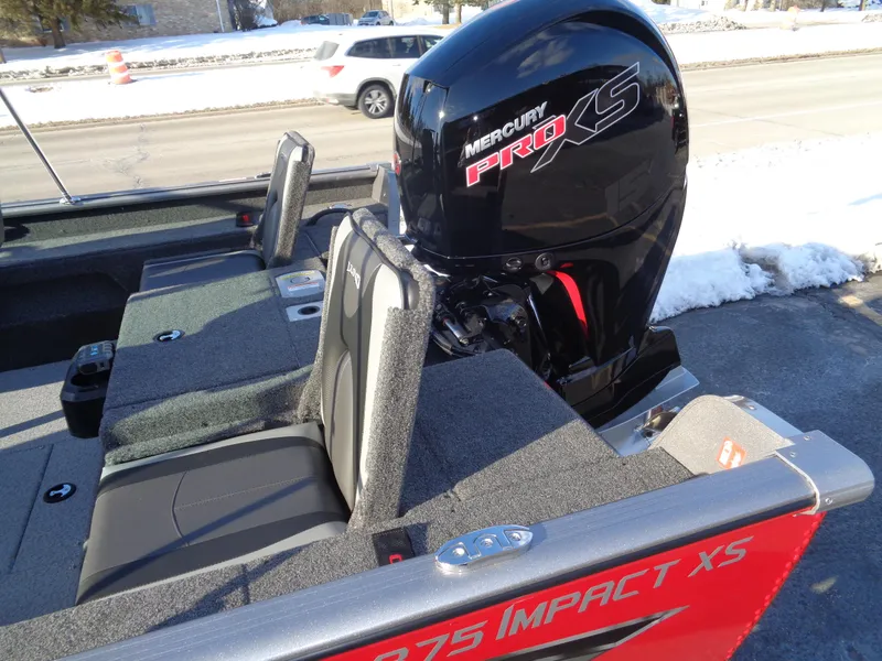 Slide: The Image of 2025 Lund 1875 Impact XS Sport boat with Mercury Pro XS engine, rear seating view. - 11