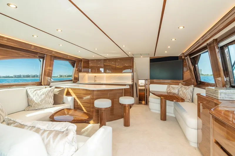 Slide: The Image of Luxurious interior of 2025 Viking 54 Convertible yacht with elegant seating and modern design. - 16