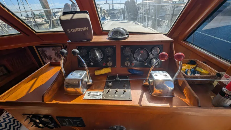Slide: The Image of Control panel of 1986 Heritage East 40 Sundeck boat with Garmin device. - 14