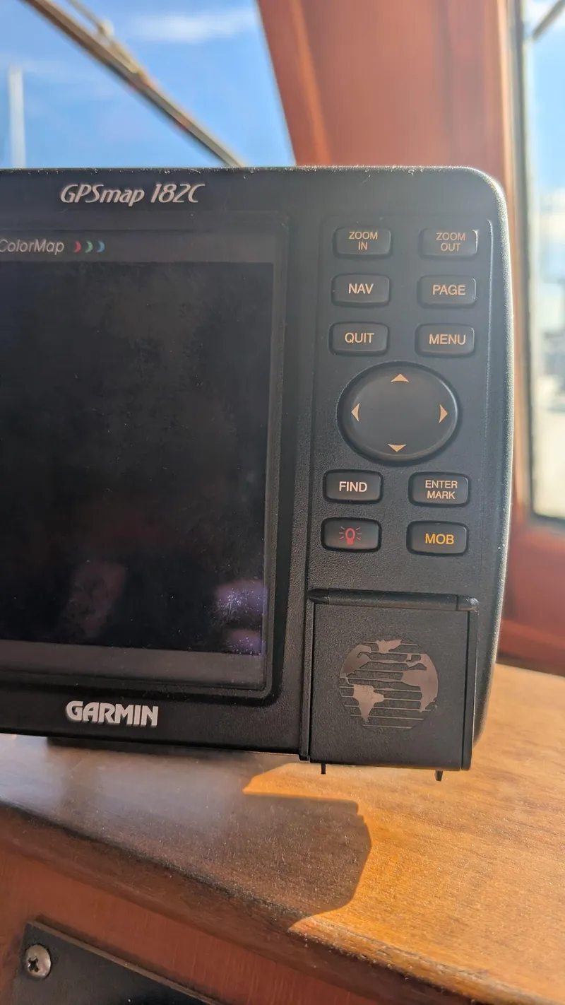 Slide: The Image of Garmin GPSmap 182C on 1986 Heritage East 40 Sundeck boat dashboard. - 15