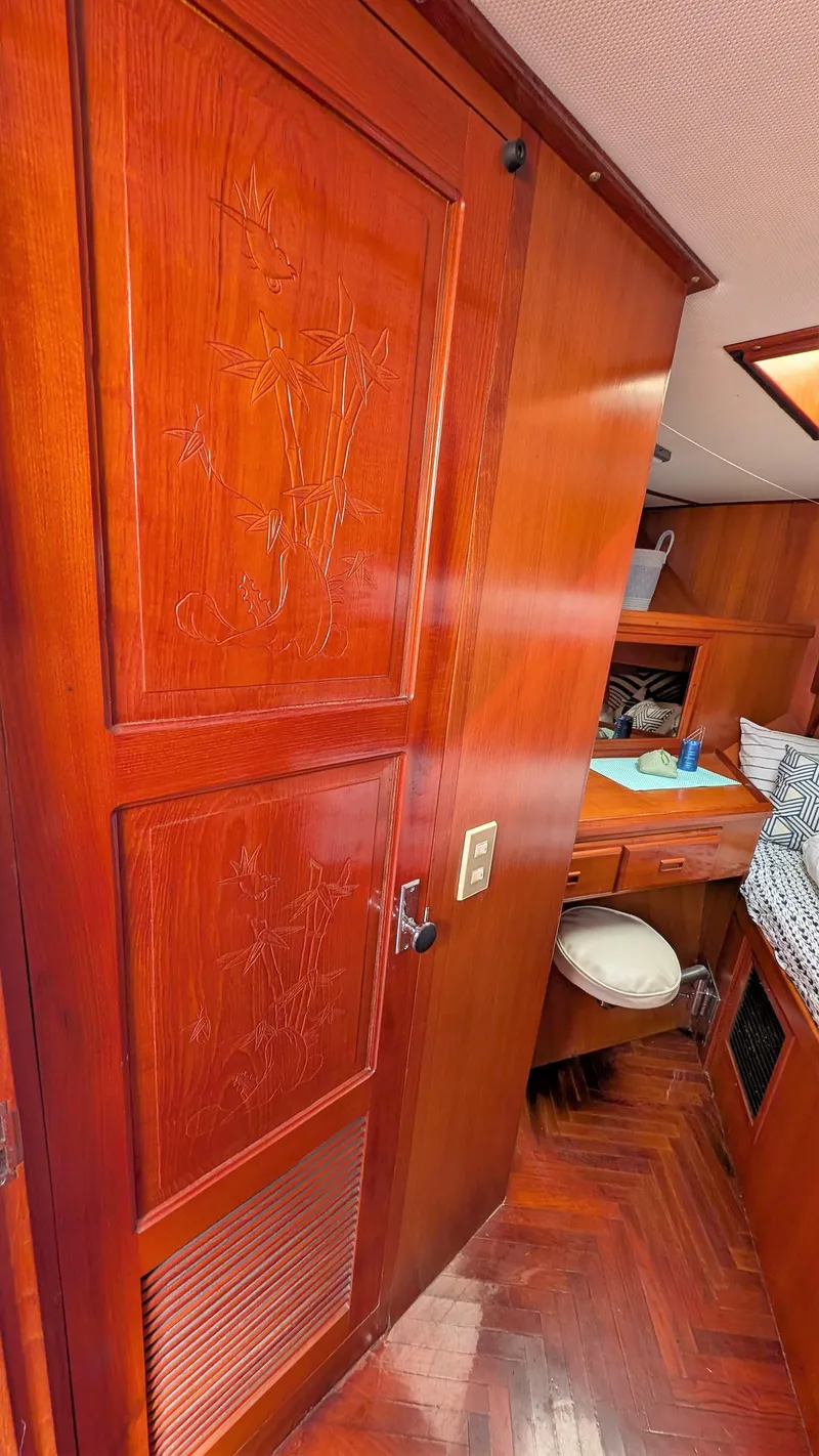 Slide: The Image of 1986 Heritage East 40 Sundeck interior with wood paneling and cozy cabin space. - 25